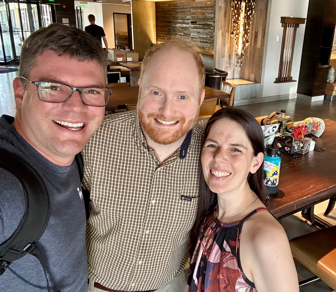Charles Roach, Frank Rietta, and Wren Steitle catching up in Boulder, Colorado in 2024.