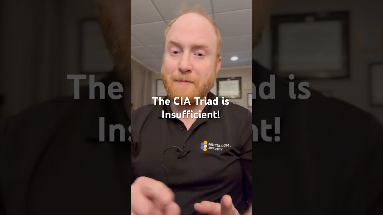Frank Rietta in a Rietta.com polo shirt, with on-screen text "The CIA Triad is Insufficient!"